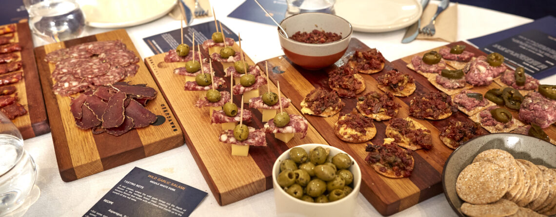 selection of cured meats and pickles