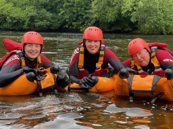 3 people on river bugs on river